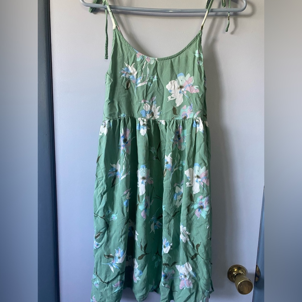 light green flowy dress with white/blue/purple flower detailing